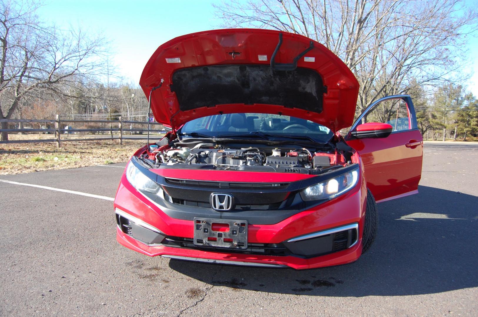 2019 RED /Black Cloth Honda Civic (2HGFC2F60KH) with an 2.0 Liter engine, Automatic transmission, located at 6528 Lower York Road, New Hope, PA, 18938, (215) 862-9555, 40.358707, -74.977882 - One family owned 2019 Honda Civic LX sedan powered by a 2.0 Liter 4 cylinder engine, front wheel drive, automatic transmission. Tilt wheel, cruise control, Dual front and side air bags, Side curtains airbags, ABS braking, AM/FM/Bluetooth/USB, Auto climate control, power windows, locks and mirrors, 1 - Photo#21